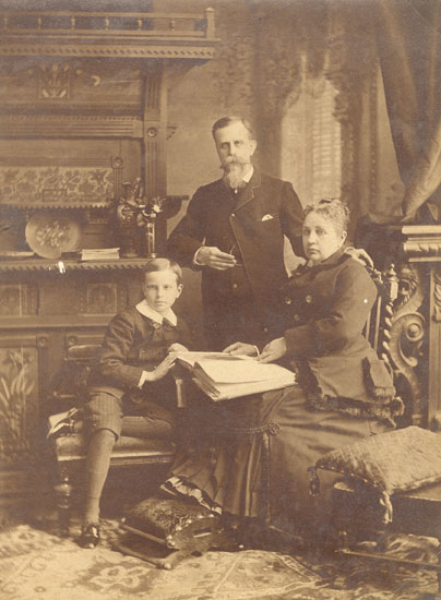 Anonymous - Family Portrait with Photo Album Anonymous - Family Portrait with Photo Album