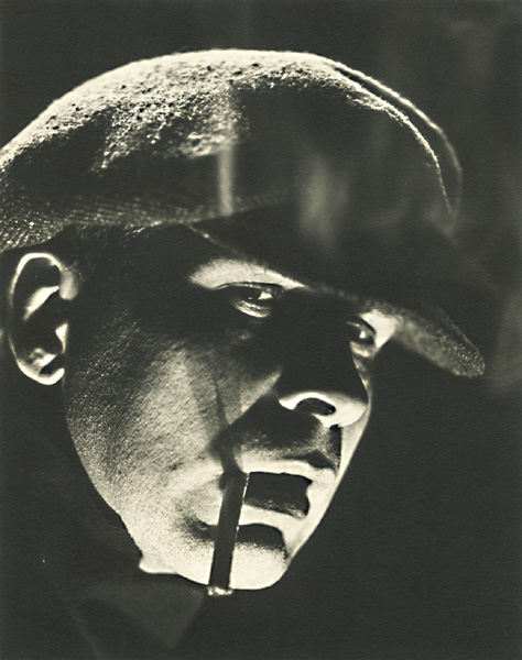 Harry S. Hood - Man Smoking Cigarette with Dramatic Lighting